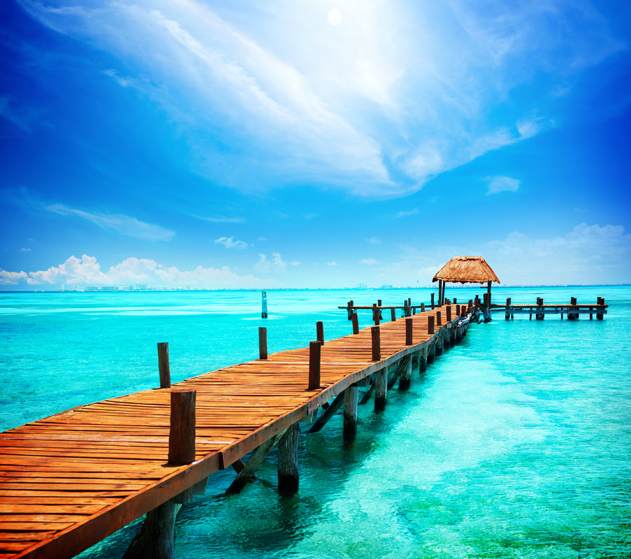 Pier over tropical turquoise water